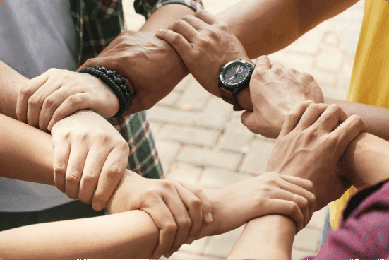 cropped-friends-holding-wrists-each-othe-chain-support-collaborate 1.png